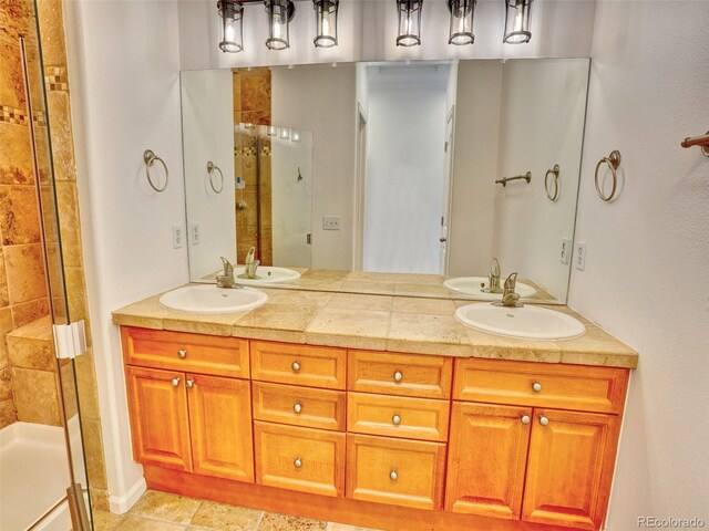 15501 E 112th Ave Unit 35B, Commerce City, CO 80022 - full bath with a stall shower and double vanity