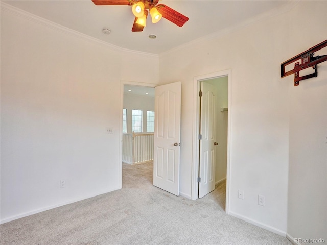 15501 E 112th Ave Unit 35B, Commerce City, CO 80022 - carpeted empty room with a ceiling fan, ornamental molding, and a smoke detector