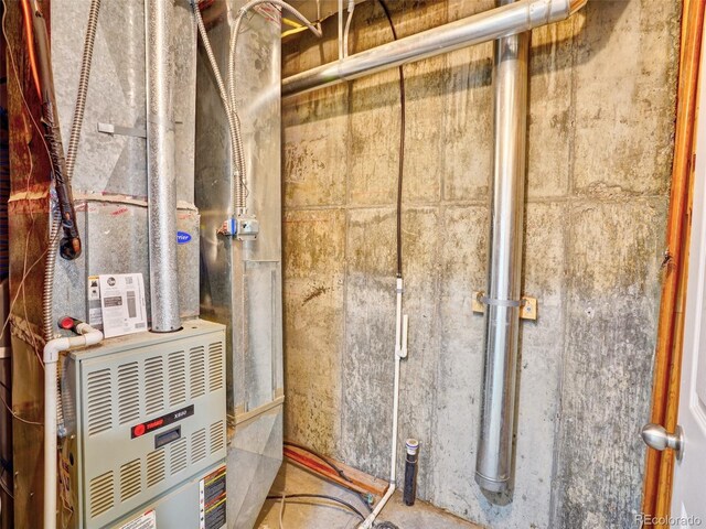 15501 E 112th Ave Unit 35B, Commerce City, CO 80022 - utility room featuring heating unit