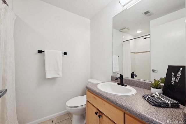 bathroom featuring tile patterned flooring, vanity, toilet, and a shower with shower curtain