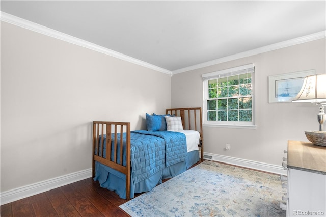 8535 E Otero Cir, Centennial, CO 80112 - bedroom featuring baseboards, hardwood / wood-style flooring, and crown molding