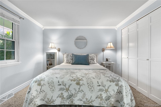 8535 E Otero Cir, Centennial, CO 80112 - carpeted bedroom with crown molding, baseboards, and a closet