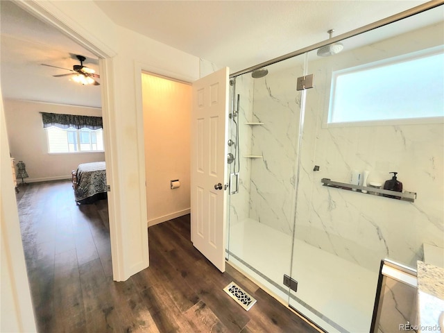 21924 E Lake Ave, Aurora, CO 80015 - bathroom with ensuite bathroom, a marble finish shower, wood finished floors, and a ceiling fan