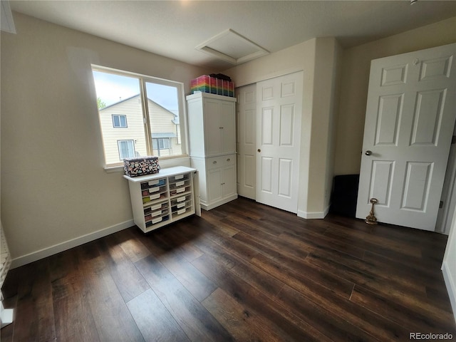 21924 E Lake Ave, Aurora, CO 80015 - bedroom with attic access, dark wood-style floors, and a closet