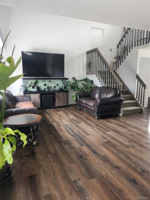21924 E Lake Ave, Aurora, CO 80015 - living room featuring wood finished floors and stairway
