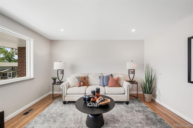 5947 W 65th Ave, Arvada, CO 80003 - living area featuring wood finished floors and recessed lighting