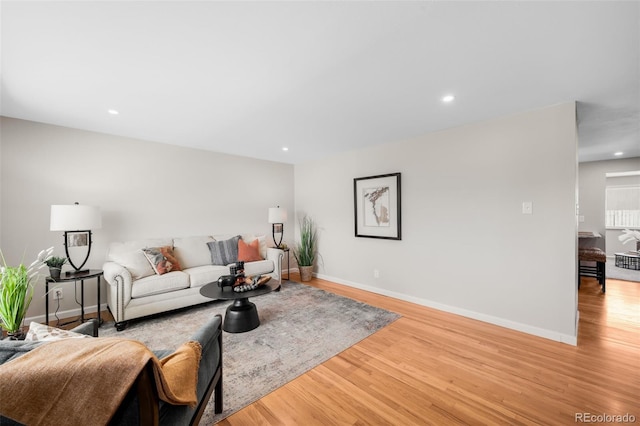 5947 W 65th Ave, Arvada, CO 80003 - living area with light wood-style flooring and recessed lighting