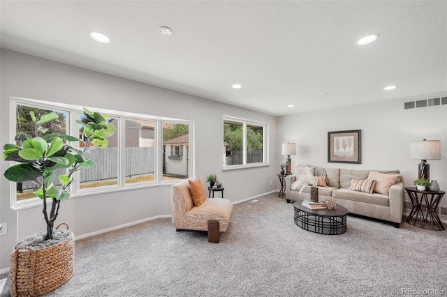5947 W 65th Ave, Arvada, CO 80003 - carpeted living room featuring recessed lighting
