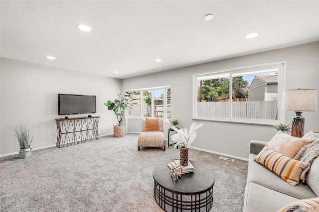 5947 W 65th Ave, Arvada, CO 80003 - carpeted living area featuring baseboards and recessed lighting