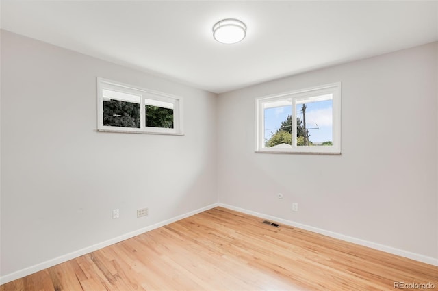 5947 W 65th Ave, Arvada, CO 80003 - empty room with baseboards and wood finished floors