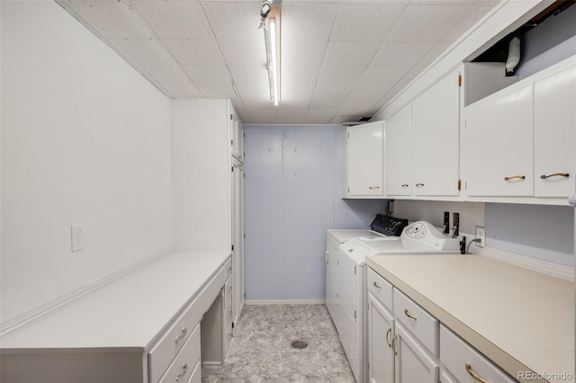 5947 W 65th Ave, Arvada, CO 80003 - washroom featuring cabinet space and independent washer and dryer