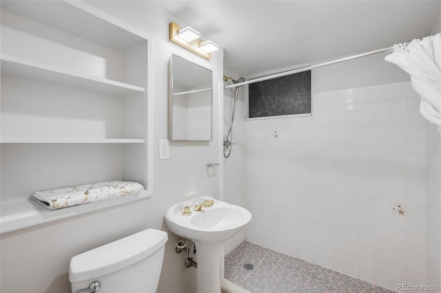 5947 W 65th Ave, Arvada, CO 80003 - full bathroom with a tile shower and toilet