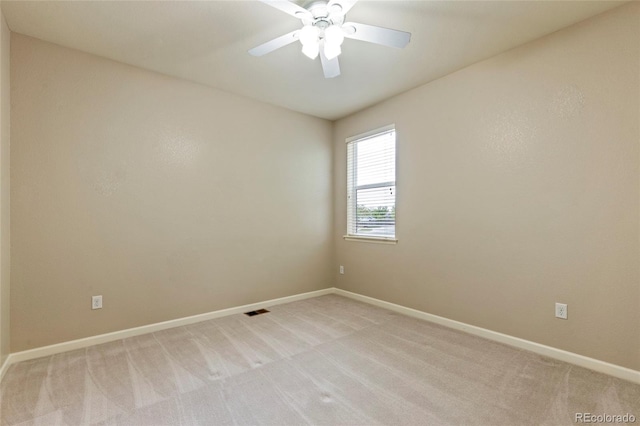 4545 Oxbow Dr, Brighton, CO 80601 - empty room with light colored carpet, baseboards, and a ceiling fan