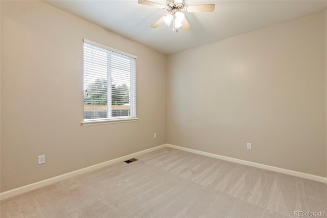 4545 Oxbow Dr, Brighton, CO 80601 - empty room featuring light colored carpet, ceiling fan, and baseboards