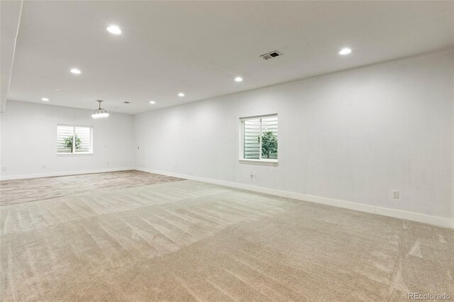 4545 Oxbow Dr, Brighton, CO 80601 - spare room featuring recessed lighting, light colored carpet, and baseboards