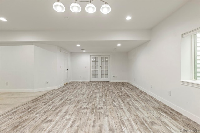 4545 Oxbow Dr, Brighton, CO 80601 - empty room featuring light wood-style flooring, baseboards, recessed lighting, and french doors