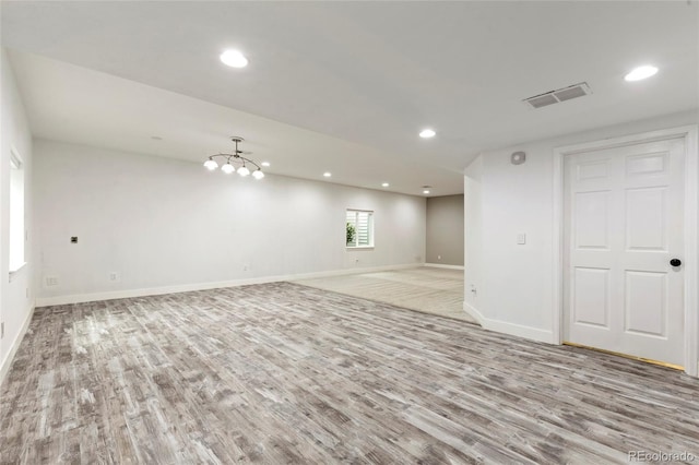 4545 Oxbow Dr, Brighton, CO 80601 - empty room featuring wood finished floors, recessed lighting, and baseboards