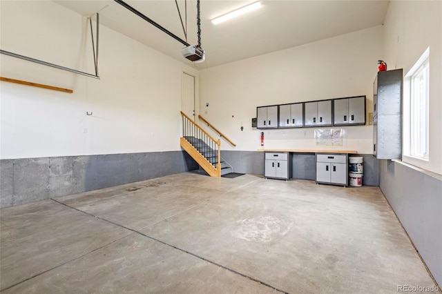4545 Oxbow Dr, Brighton, CO 80601 - garage featuring a garage door opener