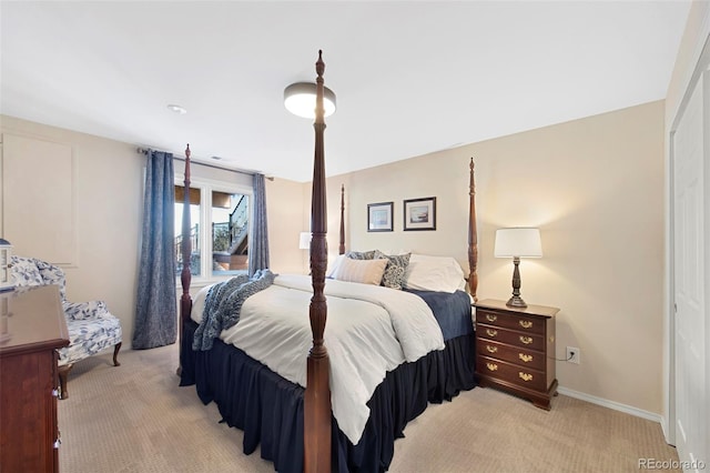 carpeted bedroom with a closet