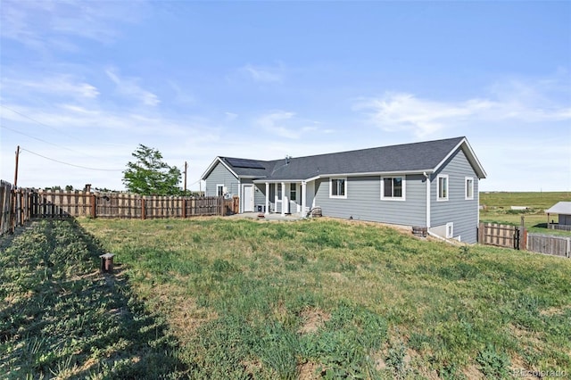 8979 Lariat Loop, Elizabeth, CO 80107 - back of house with a fenced backyard and a patio