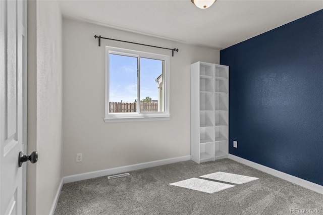 8979 Lariat Loop, Elizabeth, CO 80107 - empty room featuring carpet and baseboards