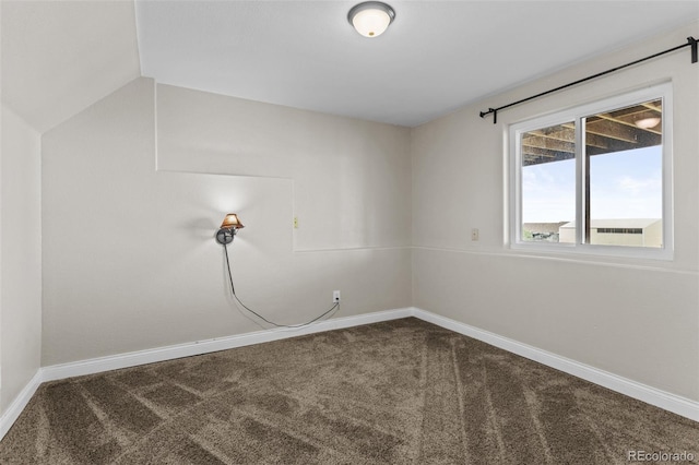 8979 Lariat Loop, Elizabeth, CO 80107 - unfurnished room featuring carpet and lofted ceiling