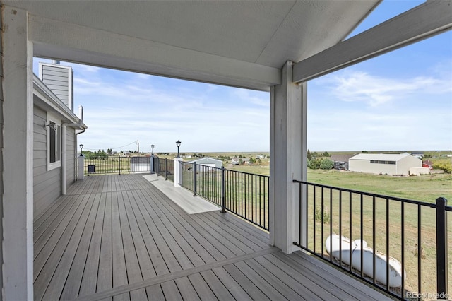 8979 Lariat Loop, Elizabeth, CO 80107 - wooden deck featuring a lawn