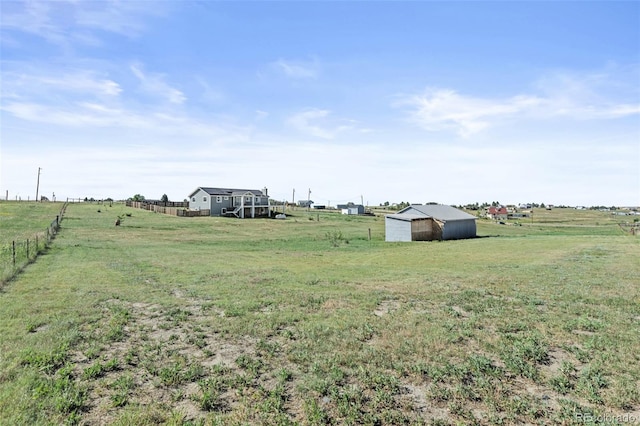 8979 Lariat Loop, Elizabeth, CO 80107 - view of yard with a rural view, a pole building, and an outbuilding