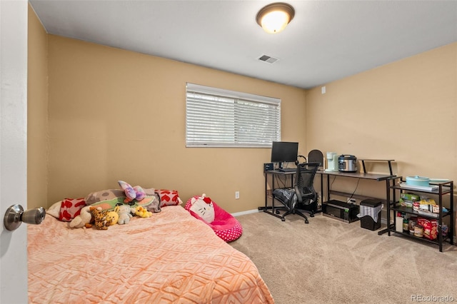 carpeted bedroom with baseboards