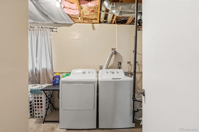 laundry room featuring separate washer and dryer