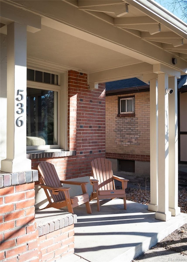 view of patio featuring covered porch