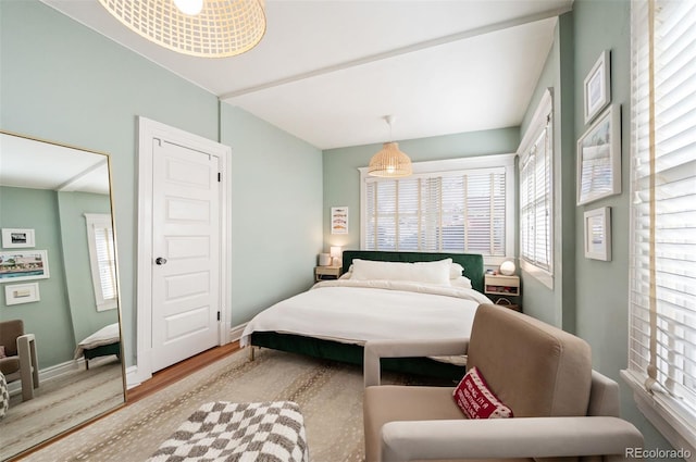 bedroom with light wood-type flooring