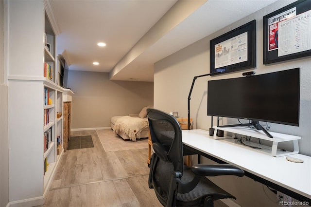 office with light hardwood / wood-style floors