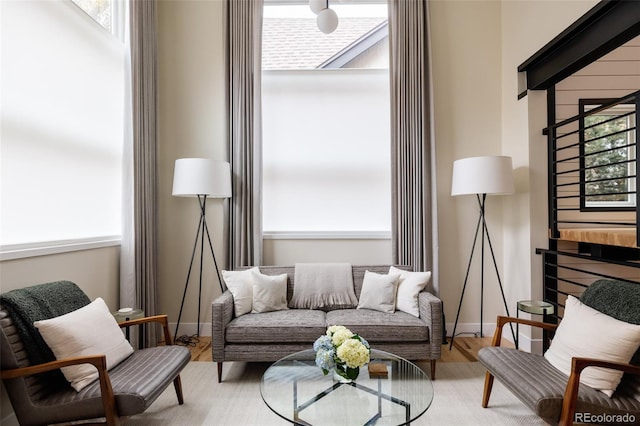 619 S High St, Denver, CO 80209 - living room featuring wood finished floors and baseboards