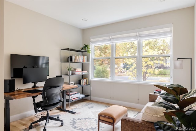 619 S High St, Denver, CO 80209 - office featuring light wood-style flooring and baseboards
