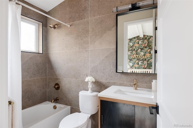 619 S High St, Denver, CO 80209 - full bath featuring vanity, toilet, shower / bath combo, and tile walls