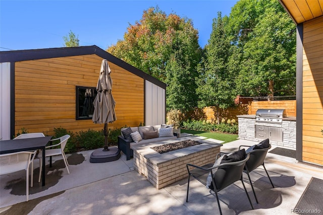 619 S High St, Denver, CO 80209 - view of patio / terrace featuring outdoor dining area and an outdoor living space with a fire pit