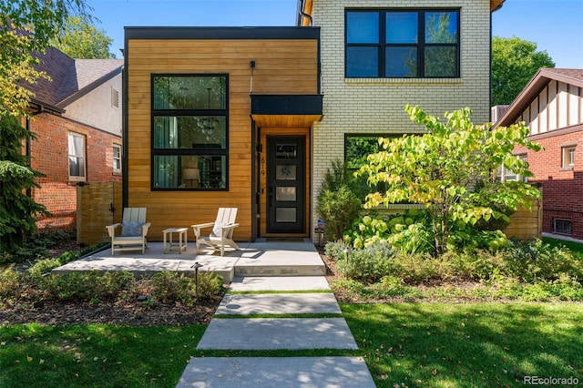 619 S High St, Denver, CO 80209 - modern home featuring brick siding