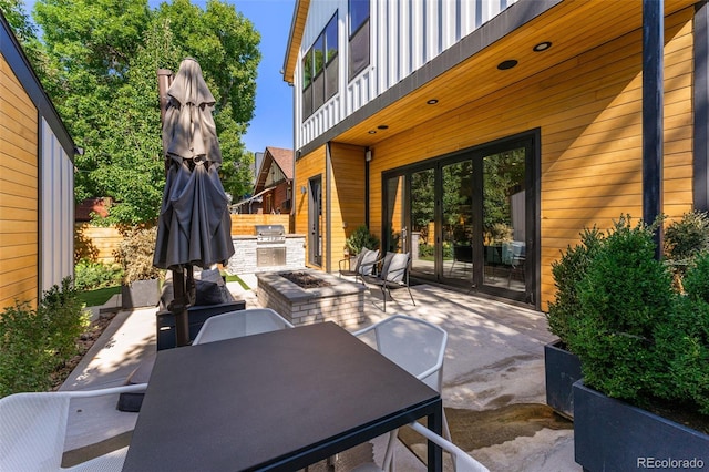 619 S High St, Denver, CO 80209 - view of patio / terrace featuring outdoor dining area, french doors, and a balcony