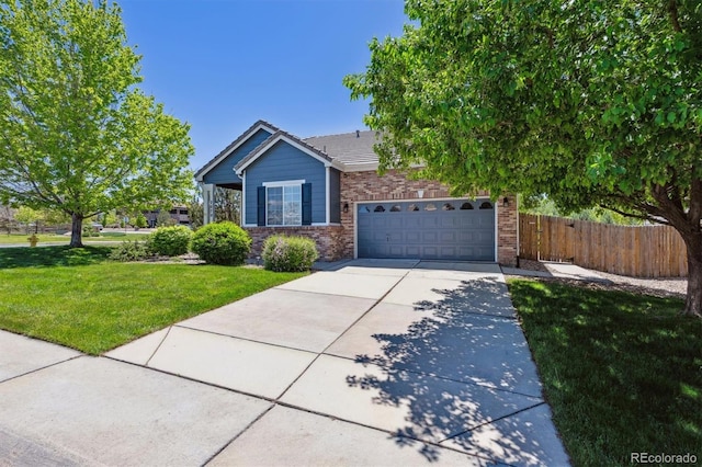 2670 E 136th Pl, Thornton, CO 80602 - view of front of house featuring concrete driveway, a garage, brick siding, and a tile roof