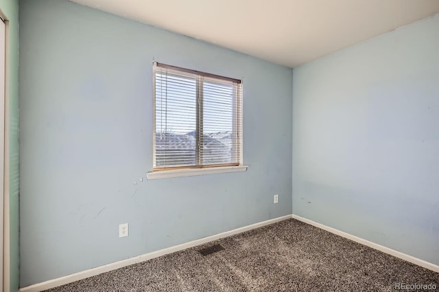 view of carpeted spare room