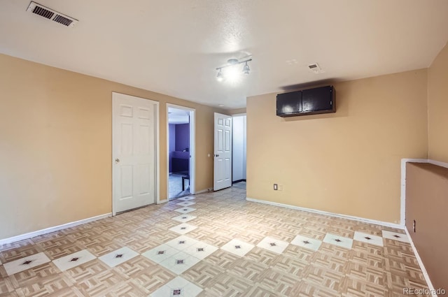 spare room with light parquet flooring