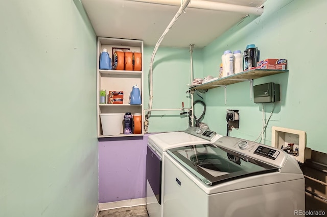 laundry room featuring washing machine and dryer