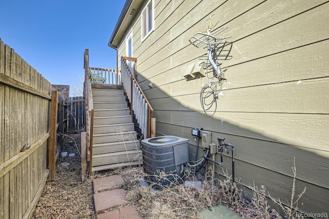 view of property exterior featuring central AC