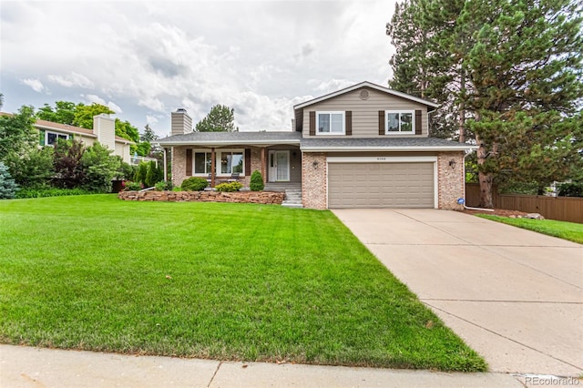 8588 S Woody Way, Highlands Ranch, CO 80126 - tri-level home featuring brick siding, a garage, concrete driveway, a chimney, and roof with shingles