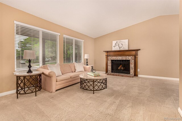 8588 S Woody Way, Highlands Ranch, CO 80126 - carpeted living room featuring vaulted ceiling and a brick fireplace