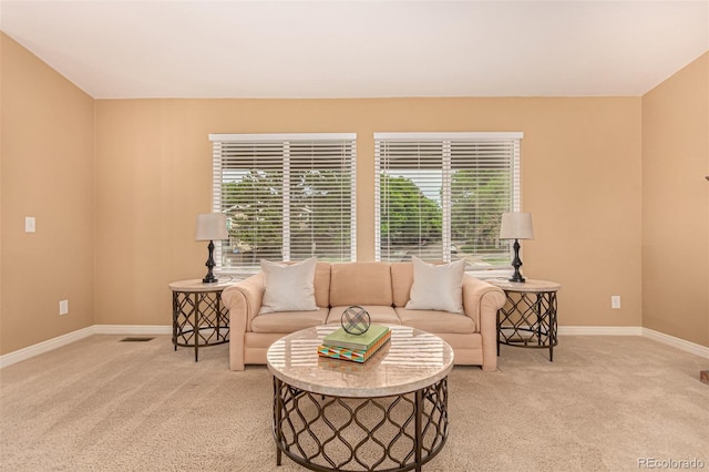 8588 S Woody Way, Highlands Ranch, CO 80126 - living area featuring light carpet and healthy amount of natural light