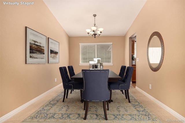 8588 S Woody Way, Highlands Ranch, CO 80126 - dining area featuring a chandelier and carpet flooring