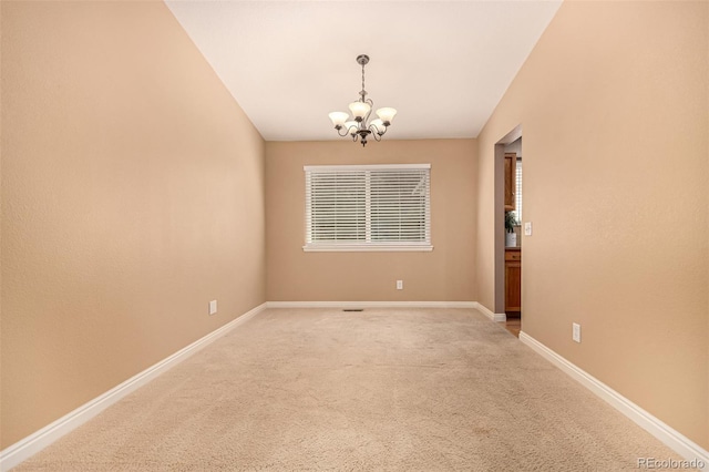8588 S Woody Way, Highlands Ranch, CO 80126 - empty room featuring a chandelier and light colored carpet
