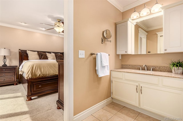 8588 S Woody Way, Highlands Ranch, CO 80126 - ensuite bathroom with vanity, ornamental molding, ceiling fan, and tile patterned flooring